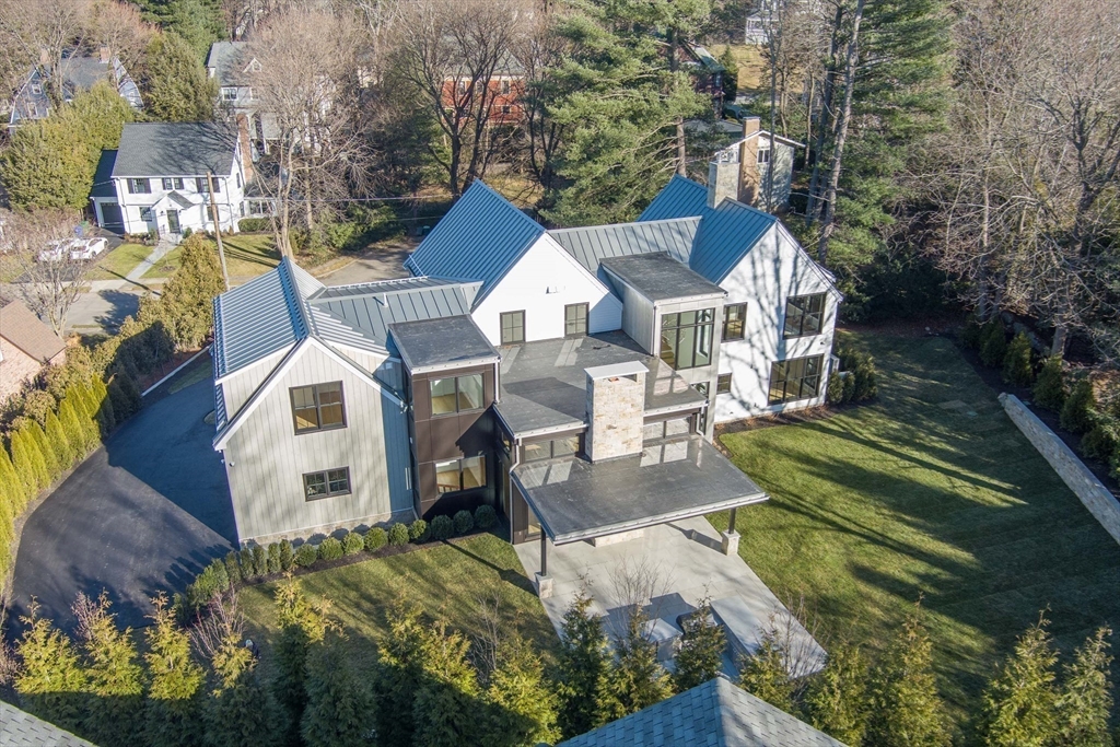 39 Westfield Road Newton, MA 02465 - Photo 42 of 42 a aerial view of a house with a yard and potted plants