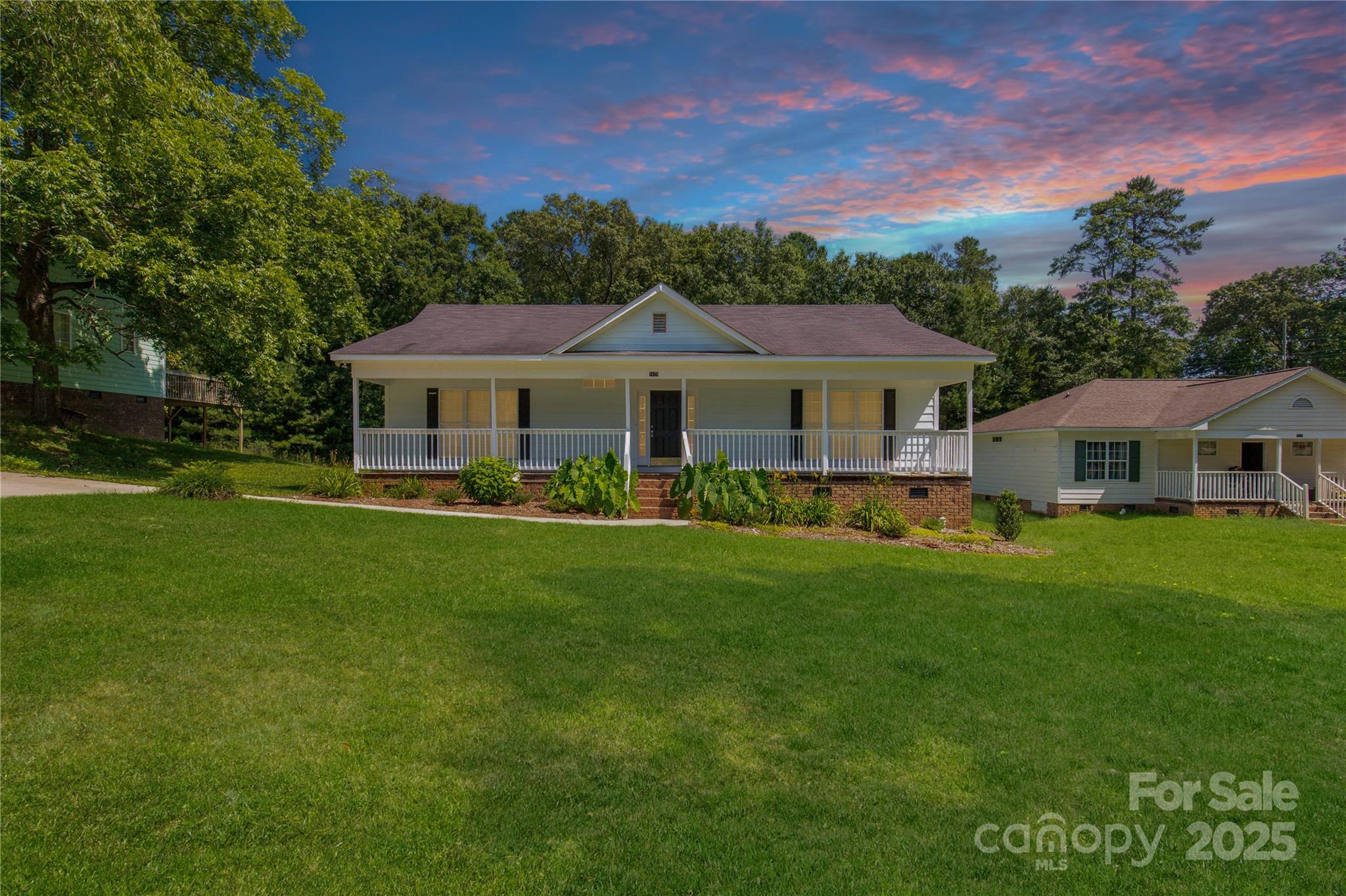 1675 Old Lynwood Circle Lancaster, SC 29720 - Photo 2 of 32 a front view of a house with a garden