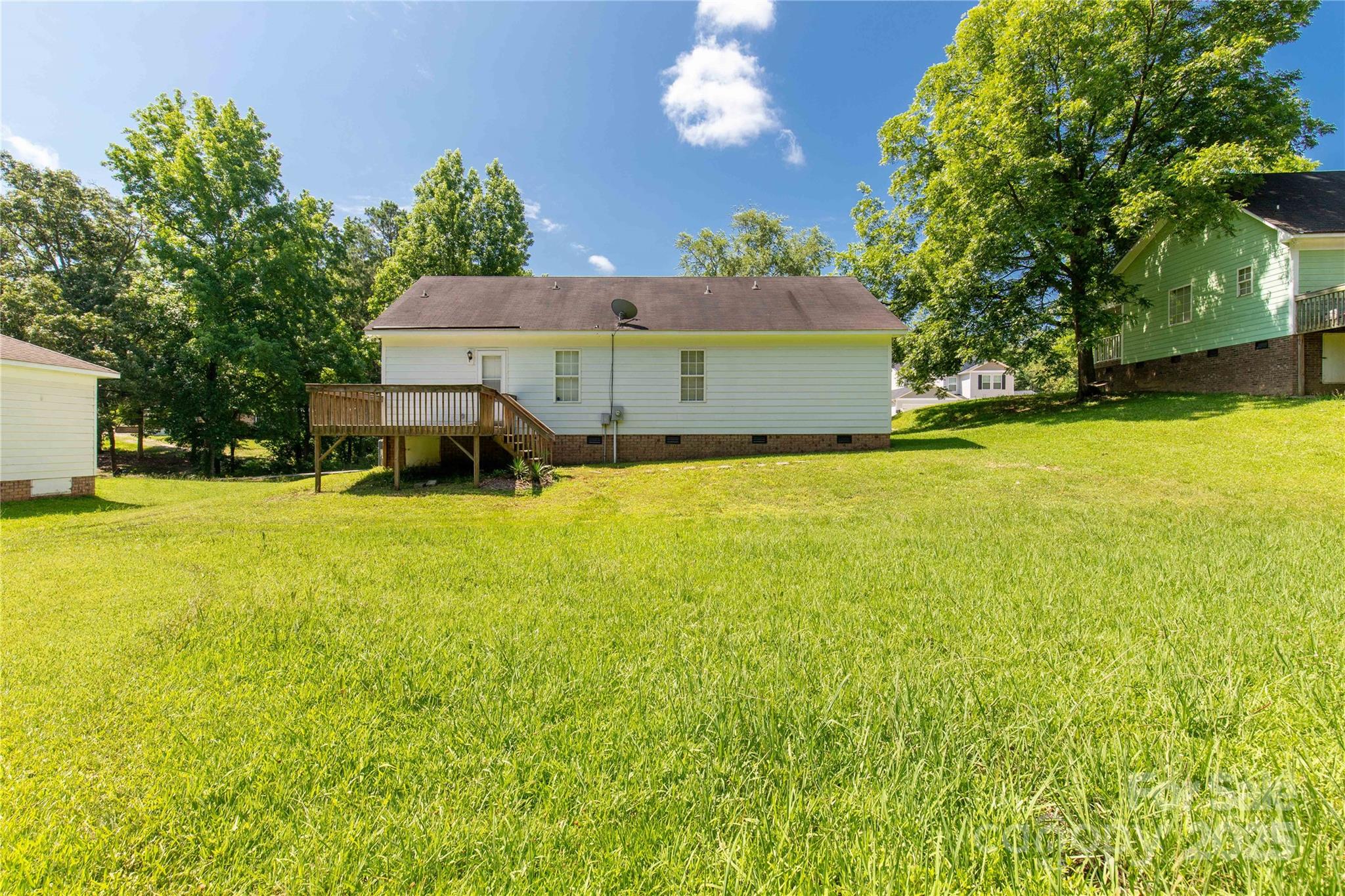 1675 Old Lynwood Circle Lancaster, SC 29720 - Photo 25 of 32 a swimming pool with outdoor seating and yard
