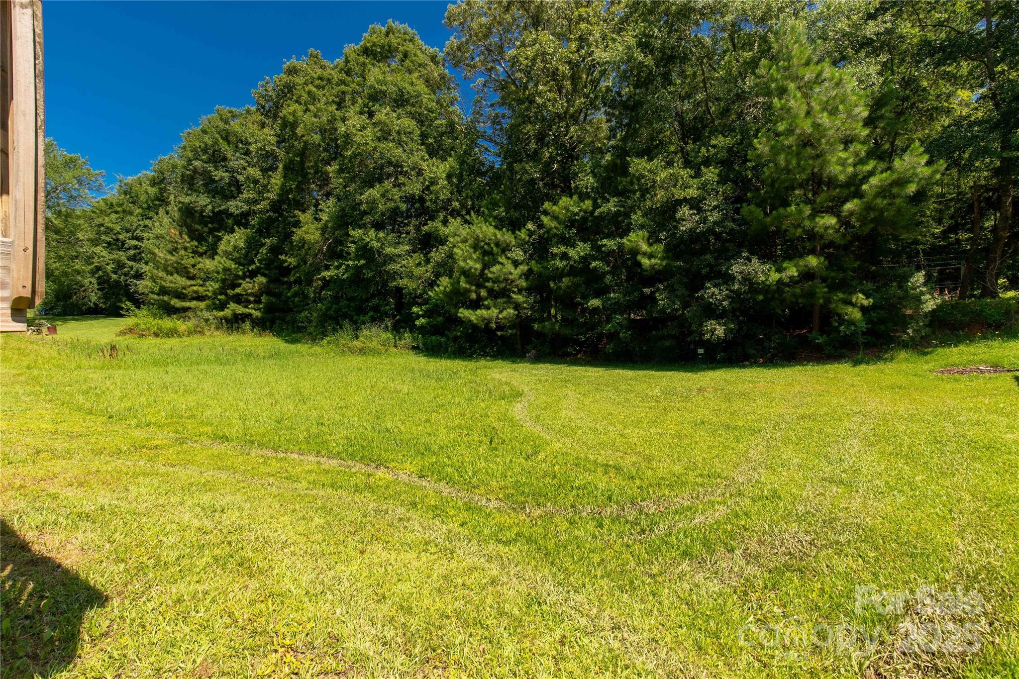1675 Old Lynwood Circle Lancaster, SC 29720 - Photo 26 of 32 a view of yard with swimming pool and green space