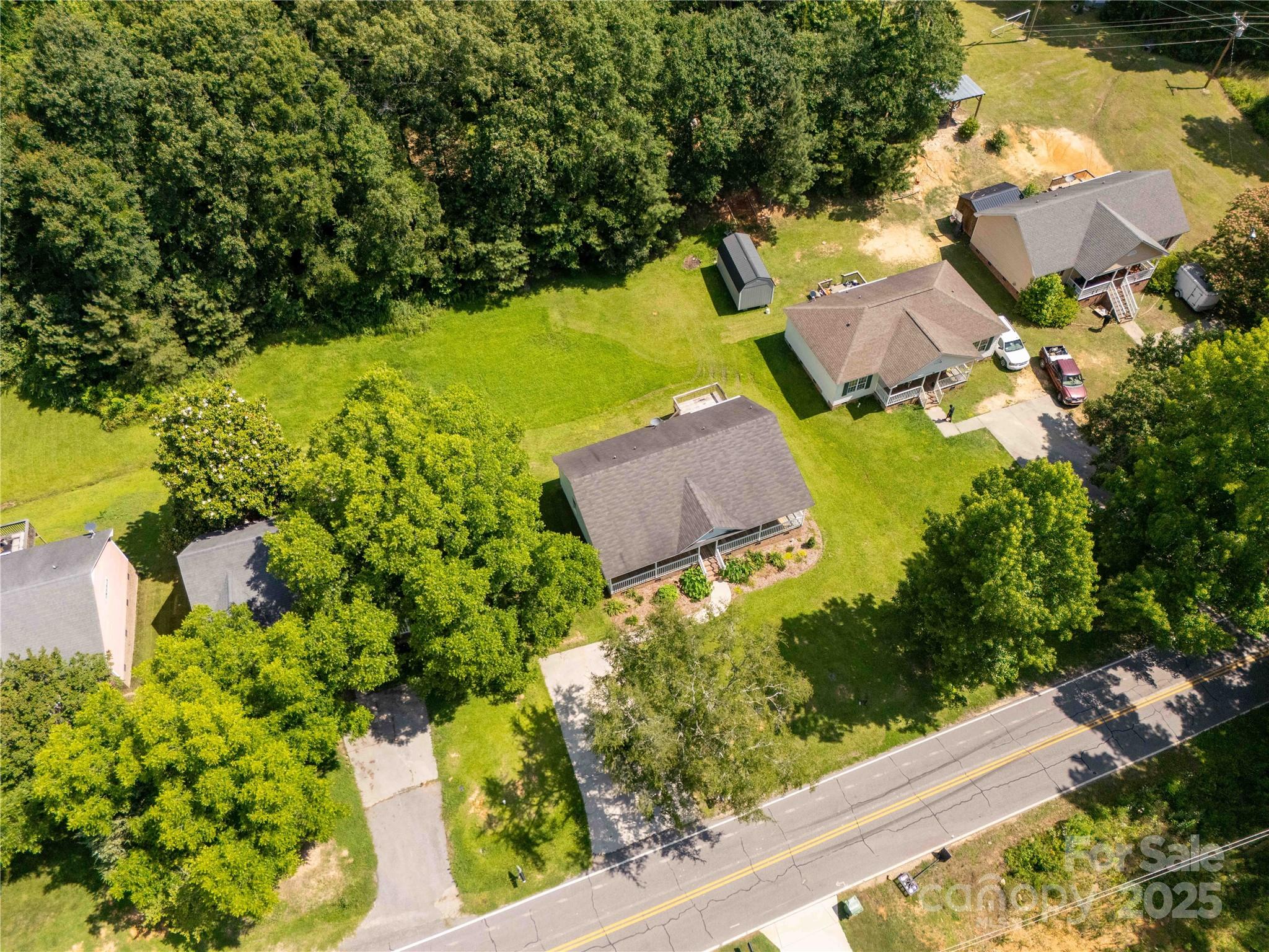 1675 Old Lynwood Circle Lancaster, SC 29720 - Photo 27 of 32 an aerial view of a house with a yard swimming pool and outdoor seating