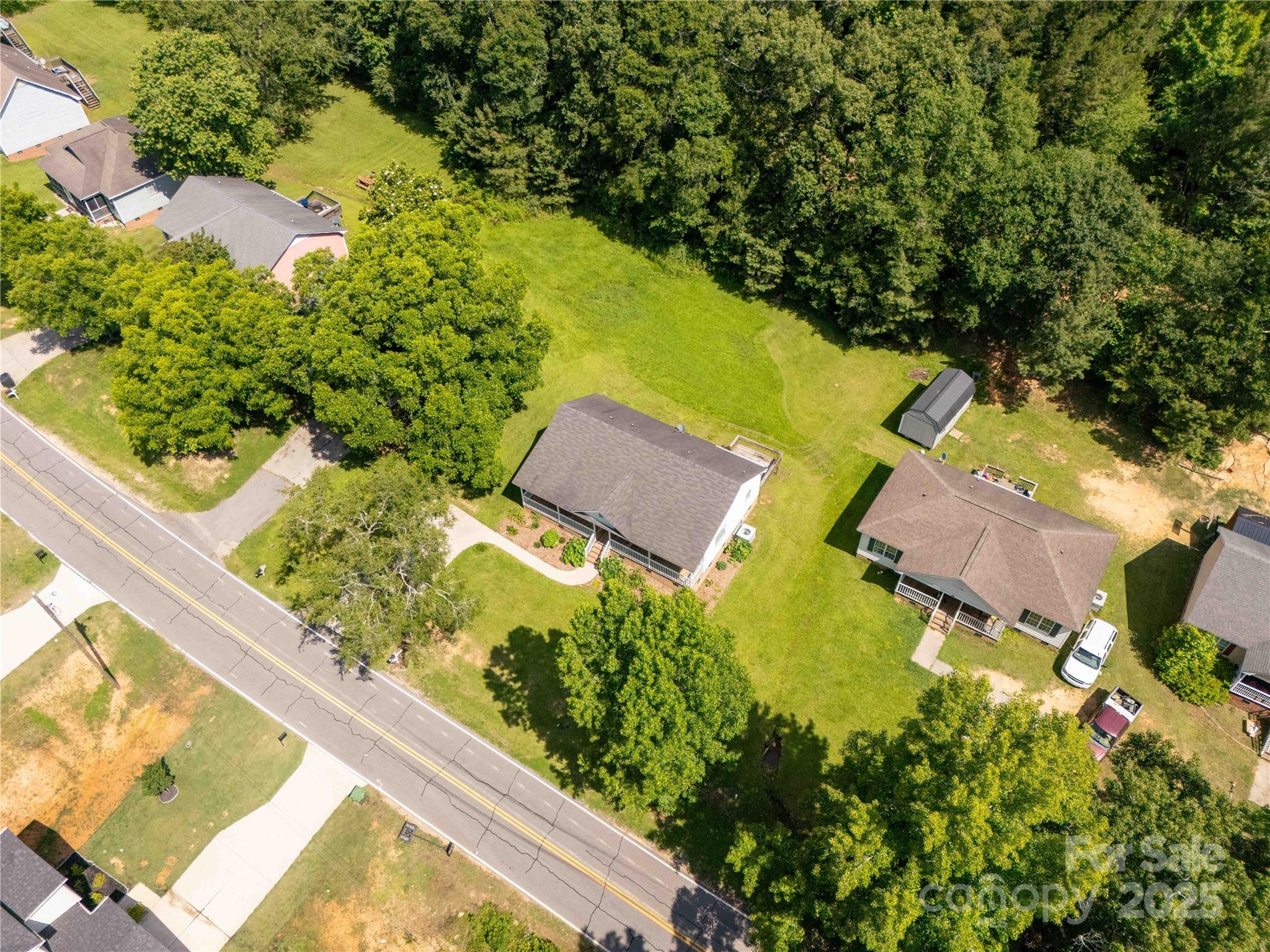 1675 Old Lynwood Circle Lancaster, SC 29720 - Photo 29 of 32 an aerial view of swimming pool with a garden