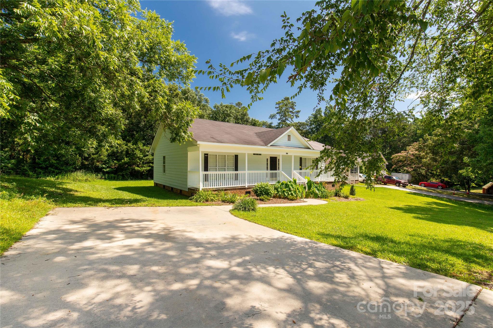 1675 Old Lynwood Circle Lancaster, SC 29720 - Photo 6 of 32 a front view of house with yard and swimming pool