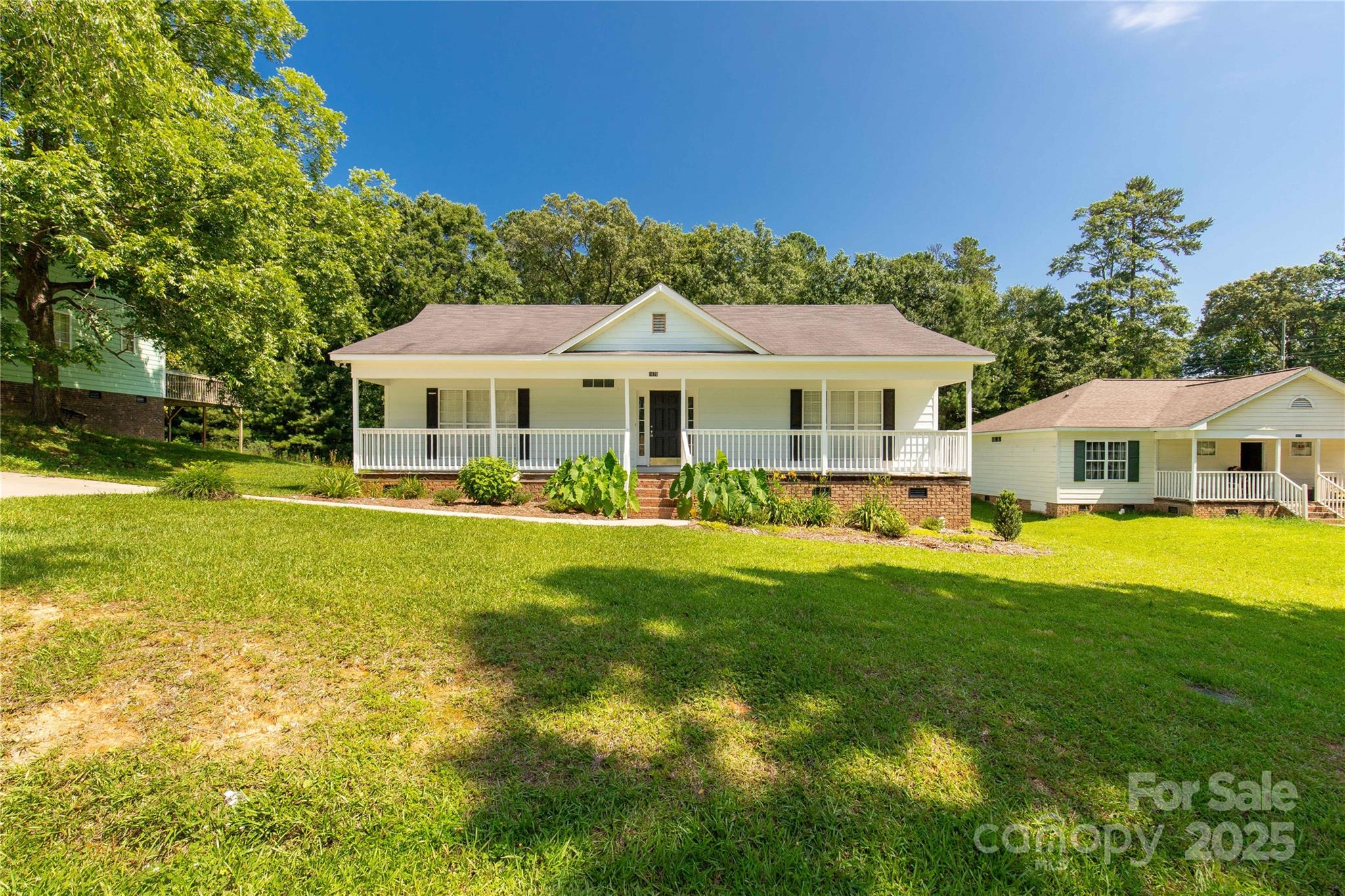 1675 Old Lynwood Circle Lancaster, SC 29720 - Photo 7 of 32 a front view of residential houses with yard and green space