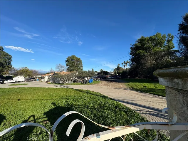 a view of a garden with an outdoor space