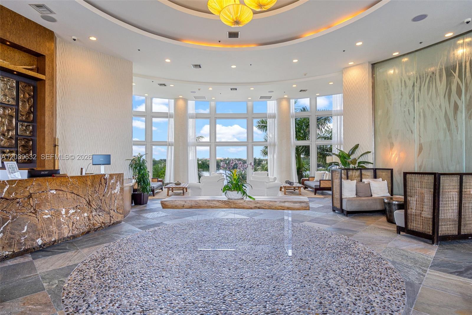 2641 North Flamingo Road, Unit 304N Sunrise, FL 33323 - Photo 2 of 31 Lobby - front desk