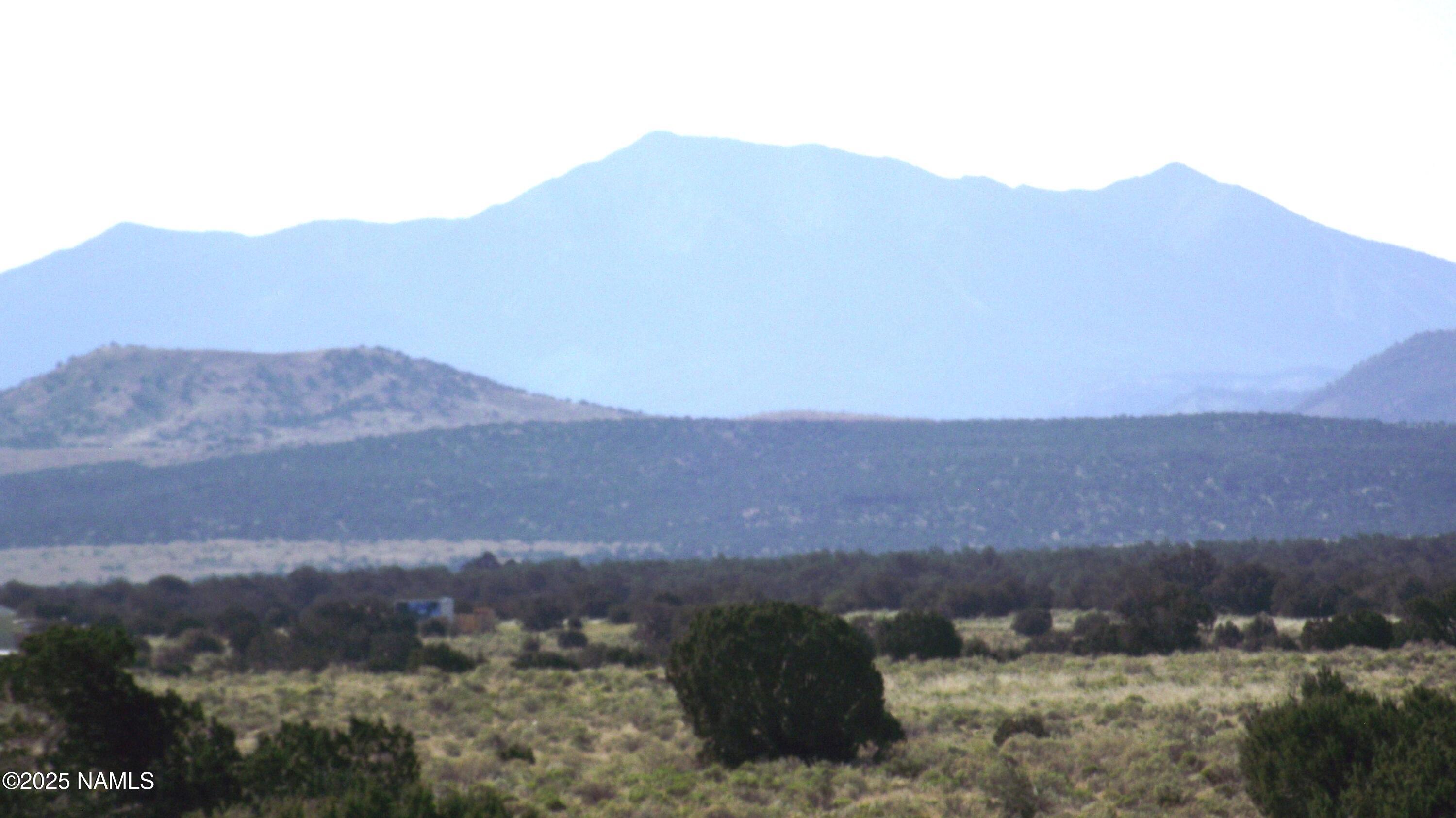 3725 South Carmen Road Williams, AZ 86046 - Photo 7 of 9 a view of a hillside and mountains