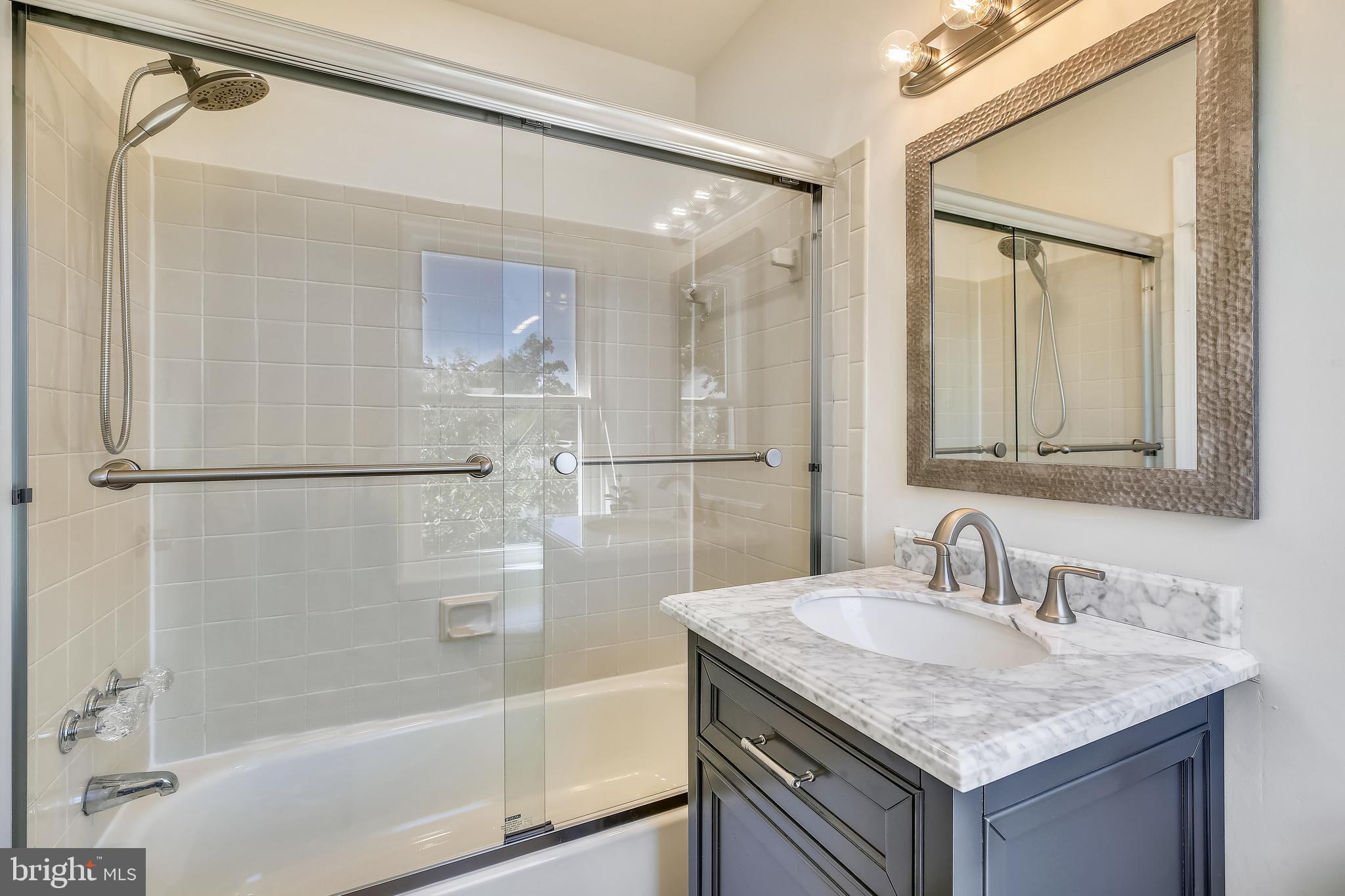 1109 Kersey Road Silver Spring, MD 20902 - Photo 41 of 65 Upstairs hall bath with tub, handheld shower.