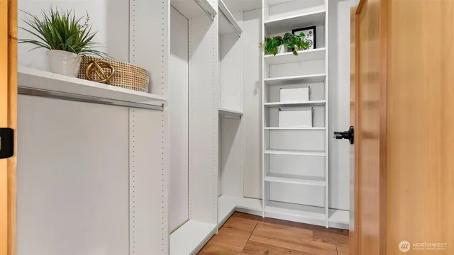 a view of walk in closet with empty space