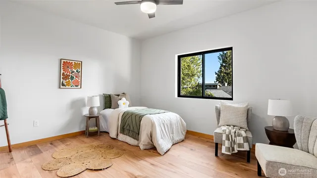 a bedroom with bed and a window