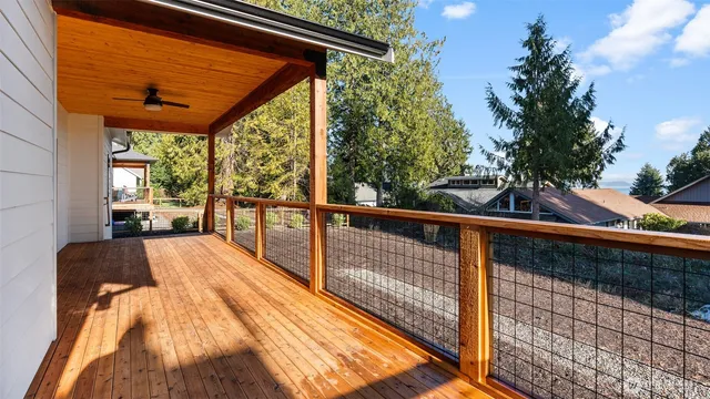 a view of balcony with wooden floor