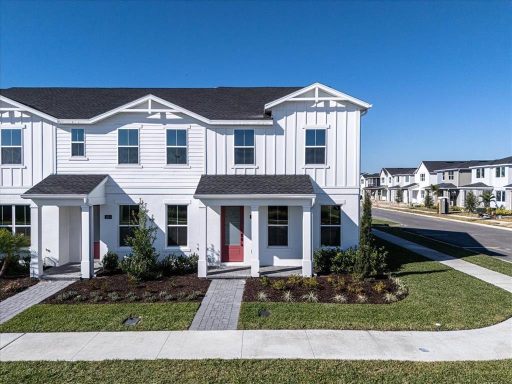 1850 Falconhurst Lane Apopka, FL 32703 - Photo 3 of 73 a front view of a house with a yard