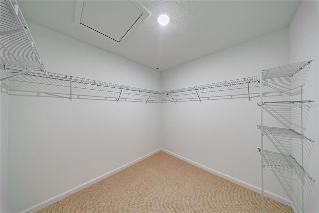 1850 Falconhurst Lane Apopka, FL 32703 - Photo 39 of 73 a view of a room with racks on the wall