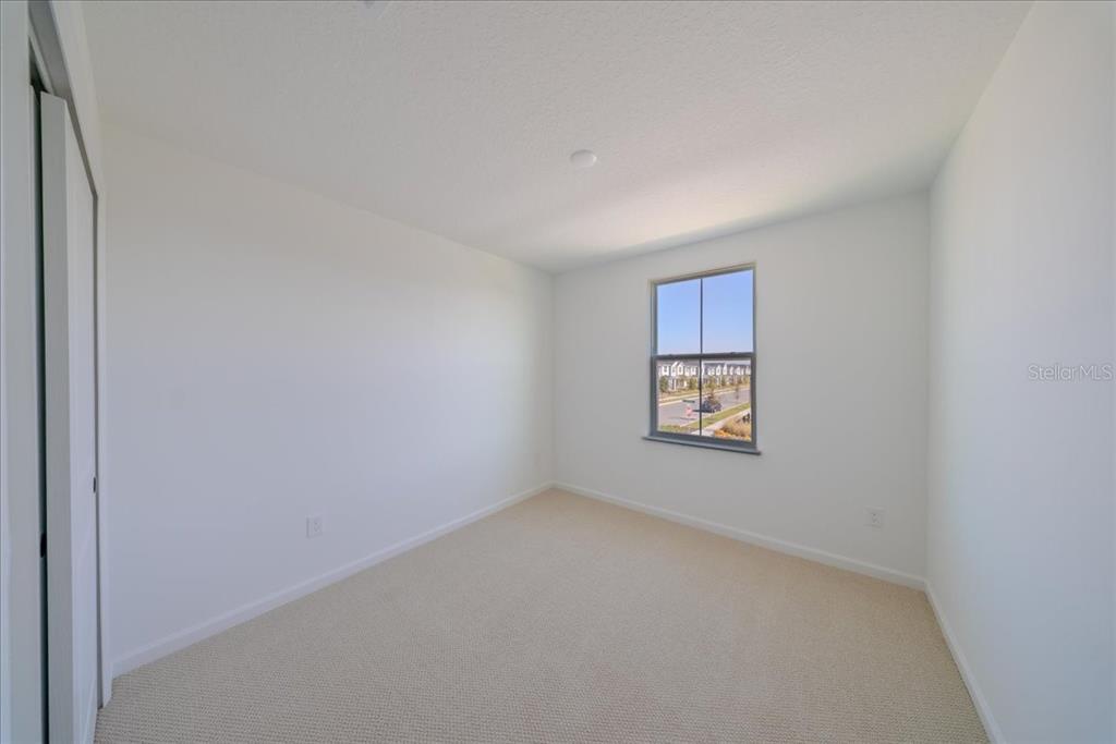 1850 Falconhurst Lane Apopka, FL 32703 - Photo 43 of 73 a view of an empty room with window