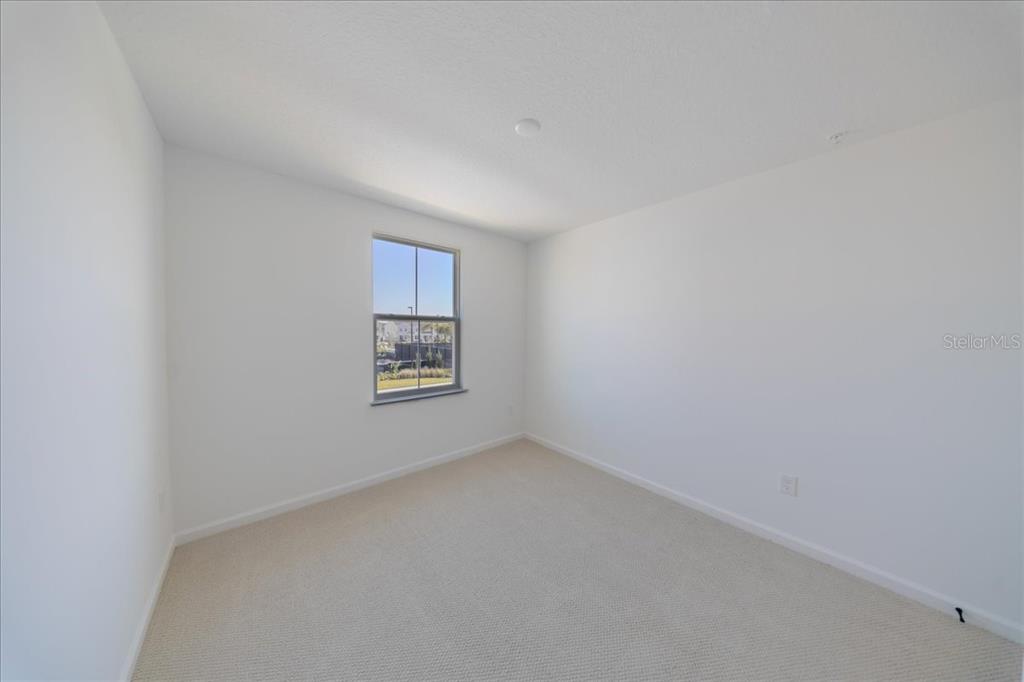 1850 Falconhurst Lane Apopka, FL 32703 - Photo 45 of 73 a view of an empty room with a window