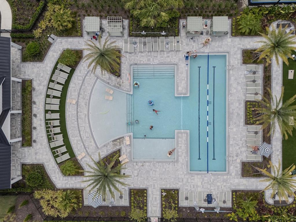 1850 Falconhurst Lane Apopka, FL 32703 - Photo 60 of 73 an aerial view of a house with a garden and plants