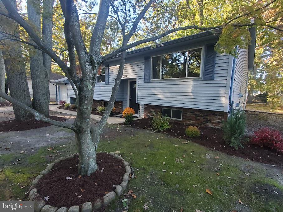 336 Pardee Boulevard Browns Mills, NJ 08015 - Photo 1 of 32 a backyard of a house with lots of green space