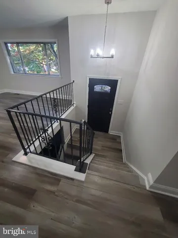 a view of entryway with wooden floor