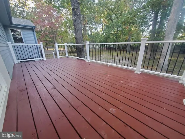 a deck view with a wooden floor space