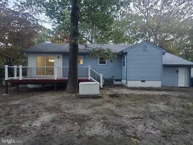 a house view with a backyard space