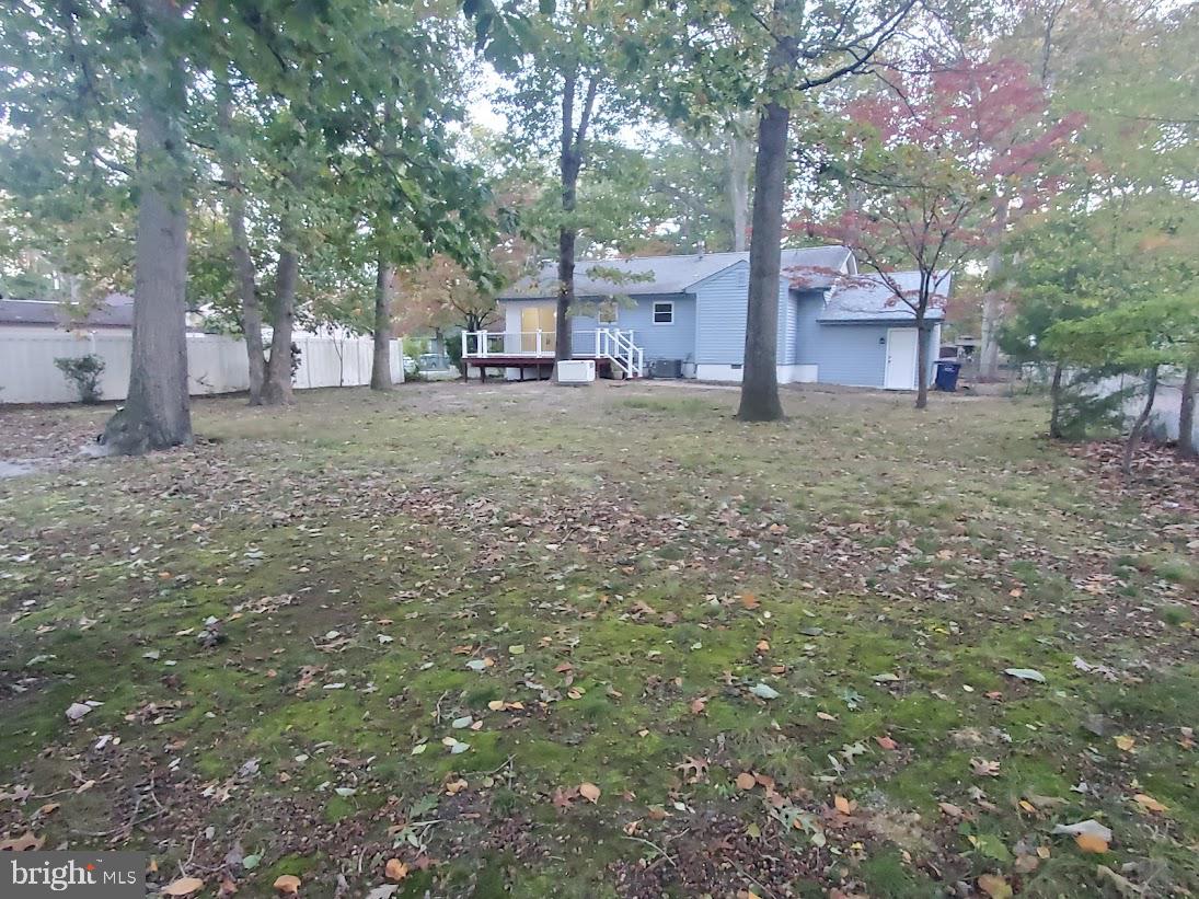 336 Pardee Boulevard Browns Mills, NJ 08015 - Photo 32 of 32 a view of a tree in the middle of a yard