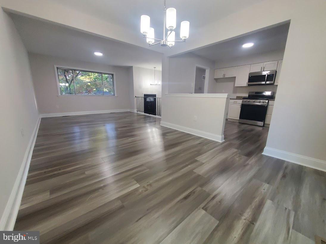 336 Pardee Boulevard Browns Mills, NJ 08015 - Photo 5 of 32 a view of a kitchen with wooden floor and a kitchen