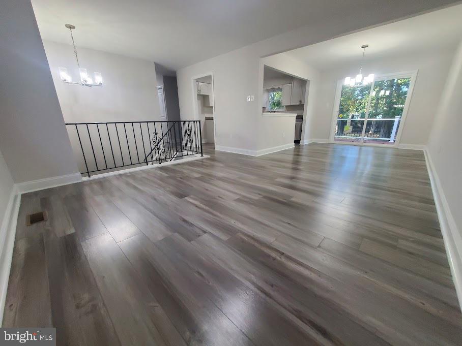 336 Pardee Boulevard Browns Mills, NJ 08015 - Photo 6 of 32 wooden floor in an empty room with a window