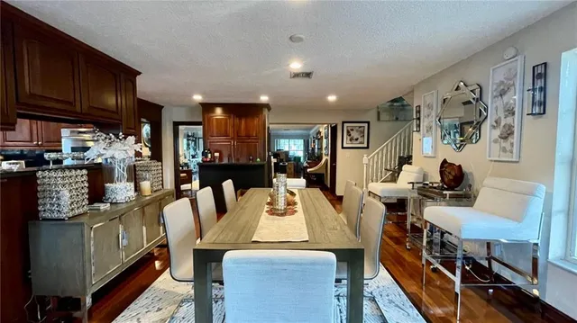 a view of a dining room with furniture