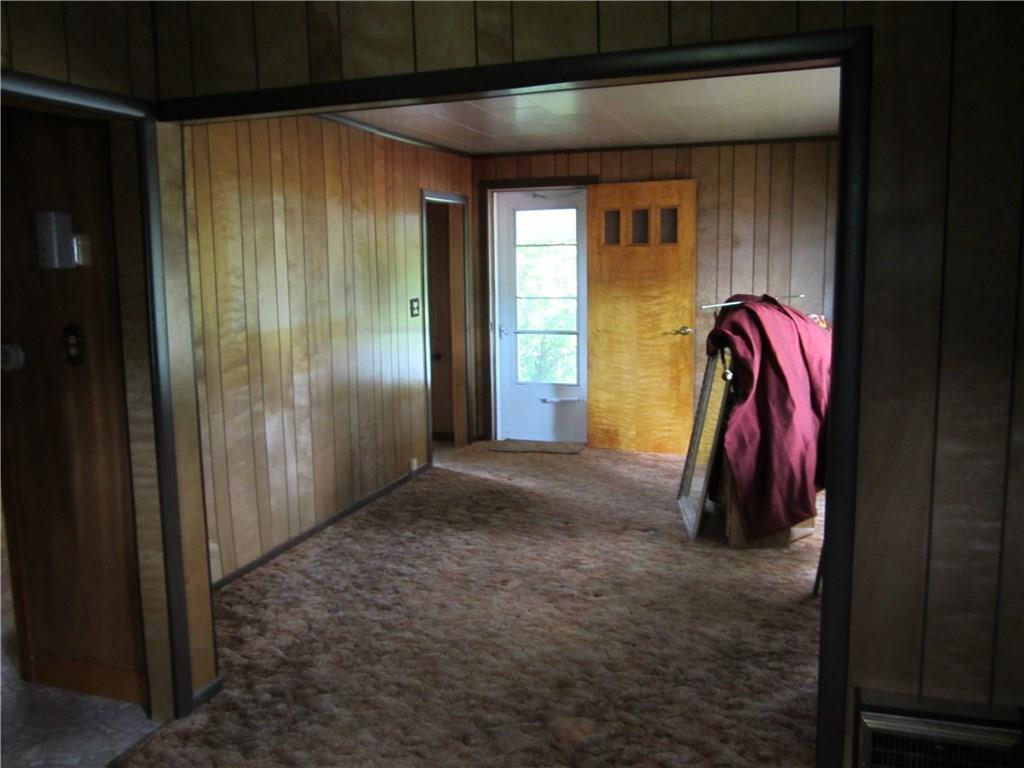 73 East Ridge Road Mars Hill, ME 04758 - Photo 10 of 20 Living room toward the front door.