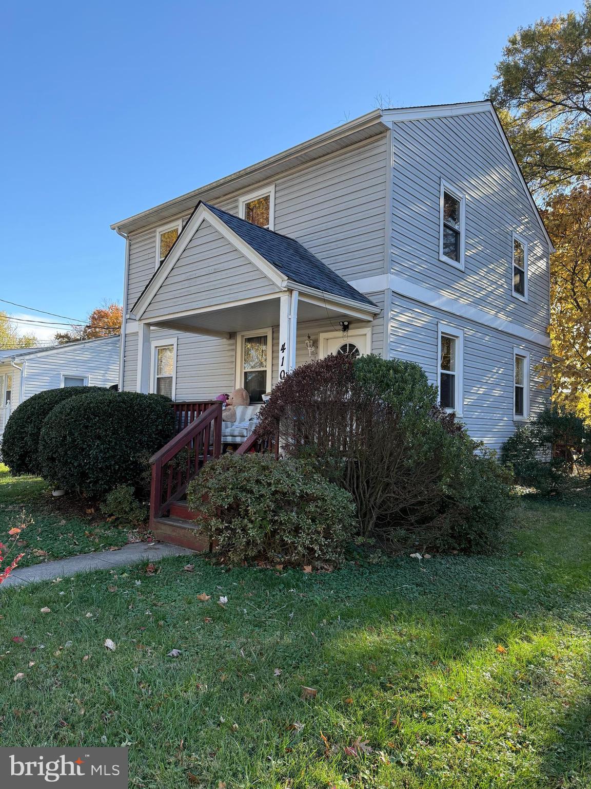 410 Carroll Avenue Laurel, MD 20707 - Photo 2 of 3 a view of a house with a garden