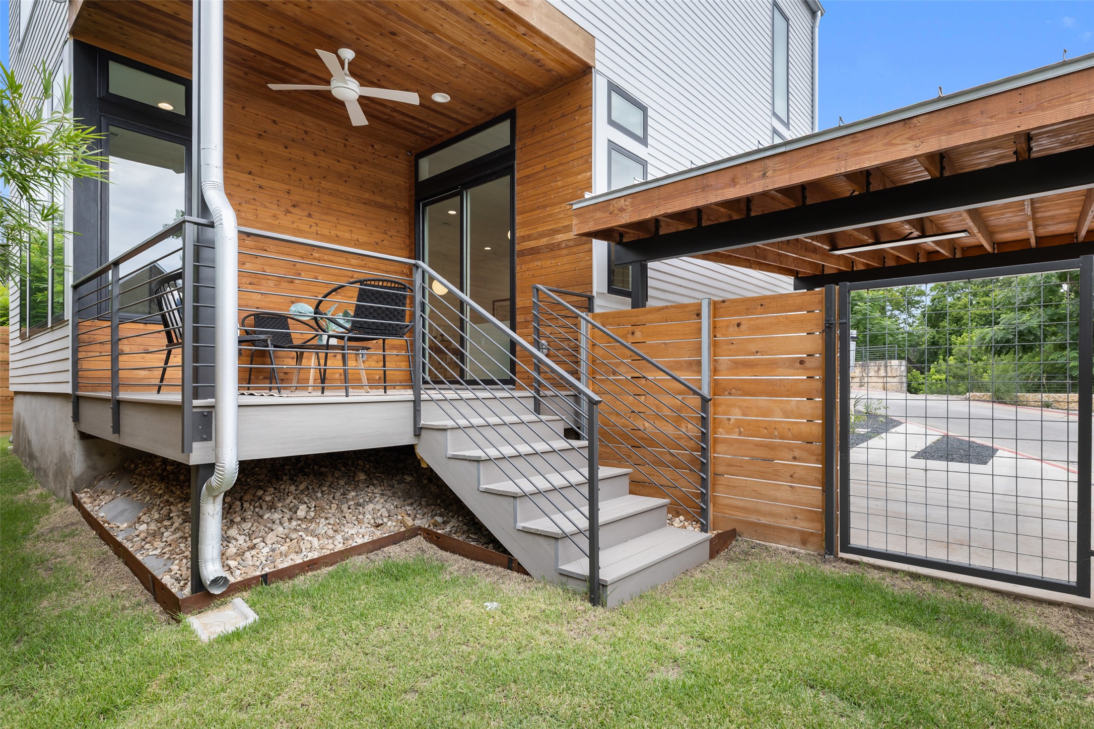 900 South 2nd Street, Unit 21 Austin, TX 78704 - Photo 25 of 25 a view of a porch with wooden walls and stairs