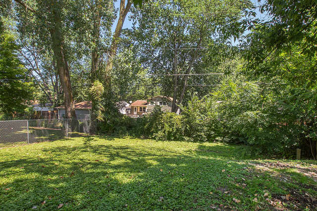 3237 Wallace Avenue Steger, IL 60475 - Photo 11 of 13 a view of swimming pool with a tree