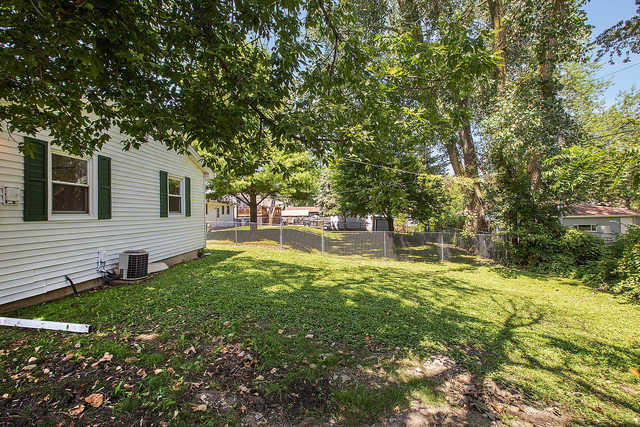 3237 Wallace Avenue Steger, IL 60475 - Photo 12 of 13 a view of a house with a yard