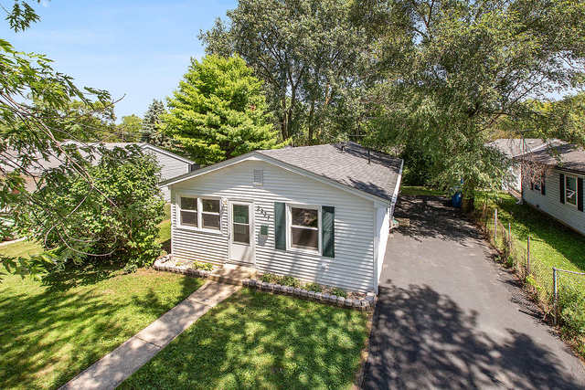 3237 Wallace Avenue Steger, IL 60475 - Photo 13 of 13 a backyard of a house with yard and outdoor seating