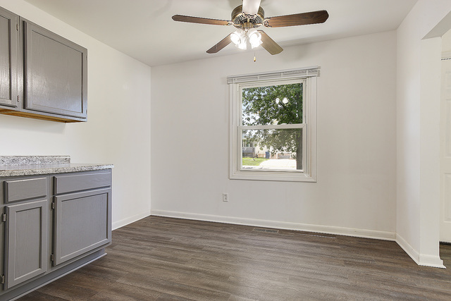 3237 Wallace Avenue Steger, IL 60475 - Photo 5 of 13 an empty room with wooden floor closet and windows