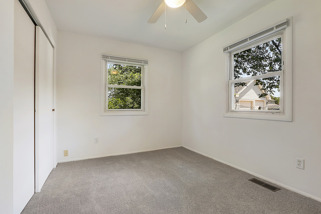 3237 Wallace Avenue Steger, IL 60475 - Photo 8 of 13 an empty room with a window and wall painting