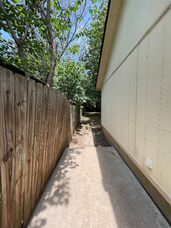 7902 Brodie Lane, Unit A Austin, TX 78745 - Photo 20 of 22 a view of backyard with wooden fence