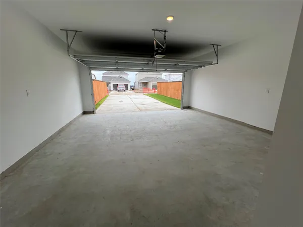 a view of room and kitchen