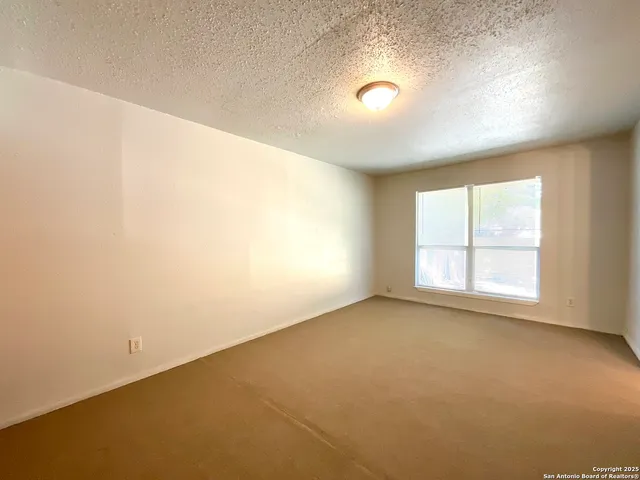 an empty room with window