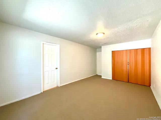 an empty room with window