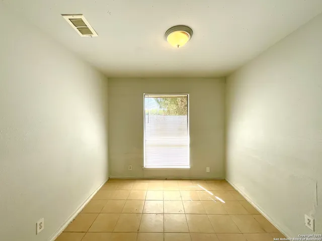 a view of house with patio