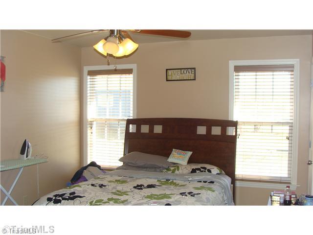 2814 Cartwright Road Boonville, NC 27011 - Photo 6 of 11 Master Bedroom. Master bedroom off back of house