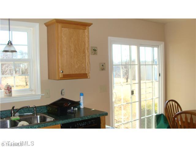 2814 Cartwright Road Boonville, NC 27011 - Photo 8 of 11 Kitchen. Bright sunny home, Small feel good price!!