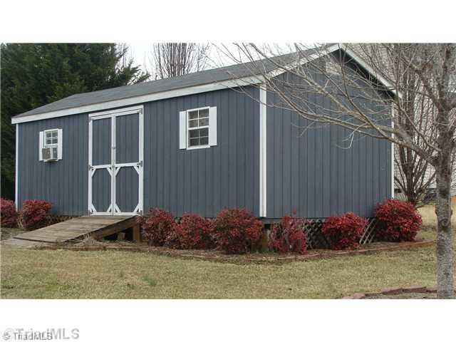 2814 Cartwright Road Boonville, NC 27011 - Photo 10 of 11 Outbuilding. Spectacular Outbuilding for your workshop projects and storage.