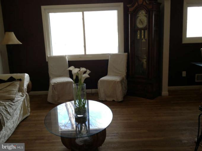 4305 Kinmount Road Lanham, MD 20706 - Photo 3 of 3 a living room with furniture and a window