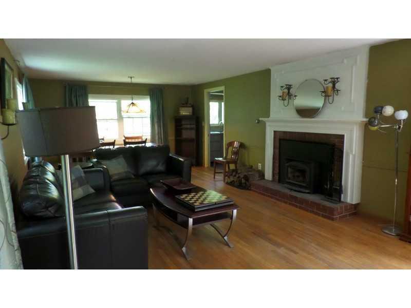 359 Pond Road Manchester, ME 04351 - Photo 9 of 25 Living Room. Living room fireplace