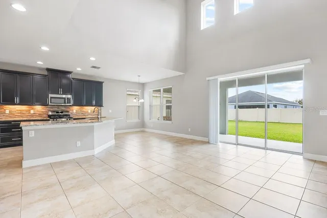 a living room with furniture or couch and a flat screen tv
