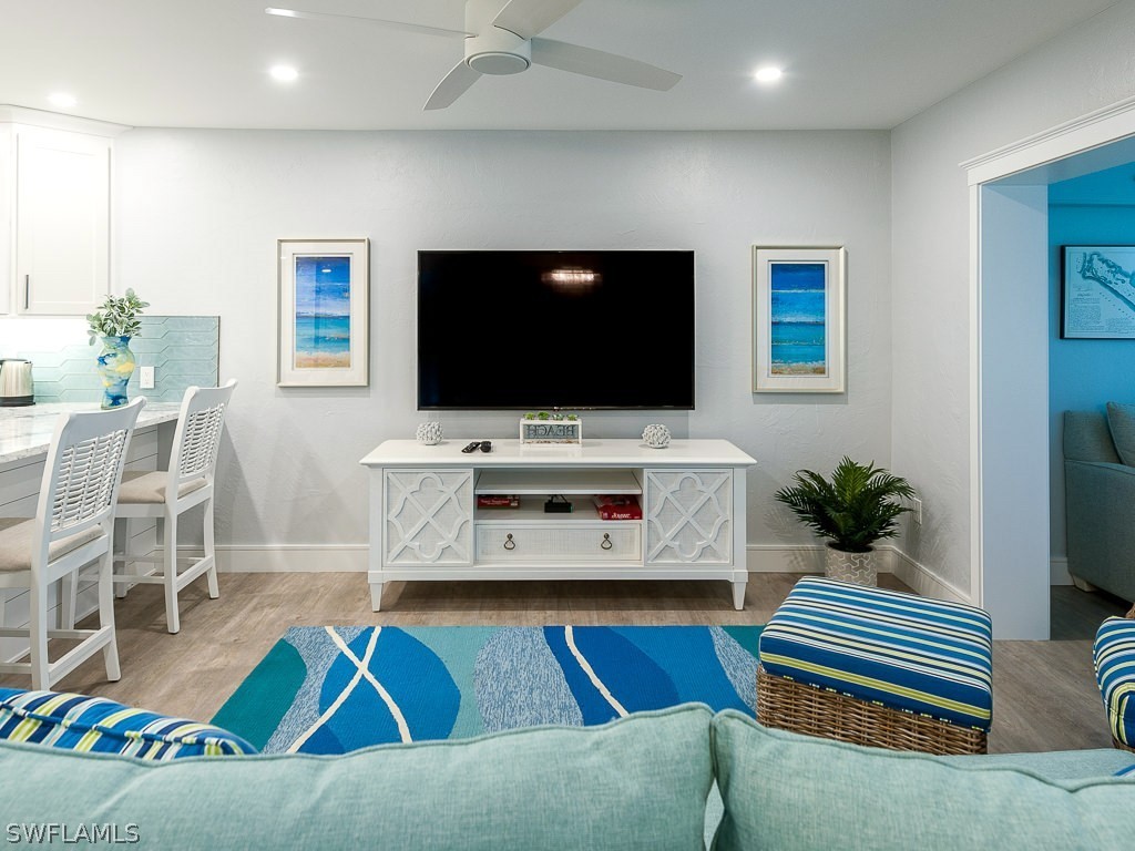 760 Sextant Drive, Unit 732 Sanibel, FL 33957 - Photo 12 of 35 a living room with furniture and a flat screen tv