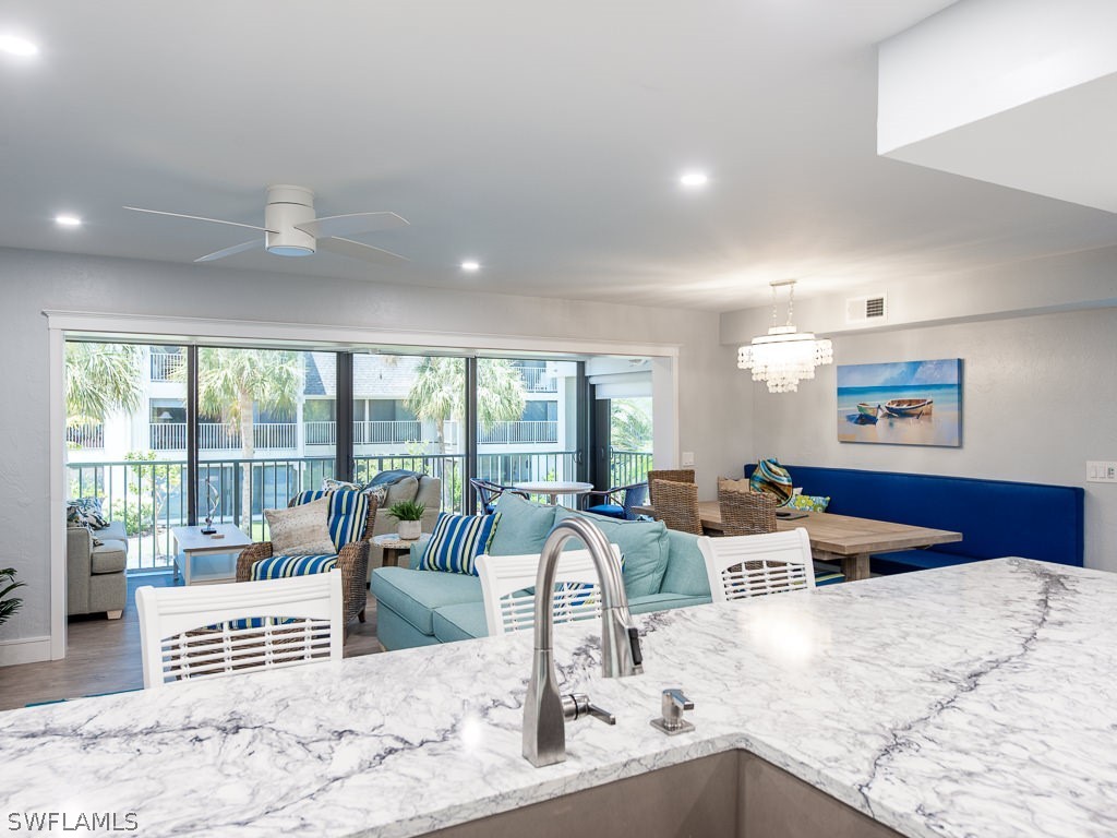 760 Sextant Drive, Unit 732 Sanibel, FL 33957 - Photo 18 of 35 a view of a living room and kitchen floor