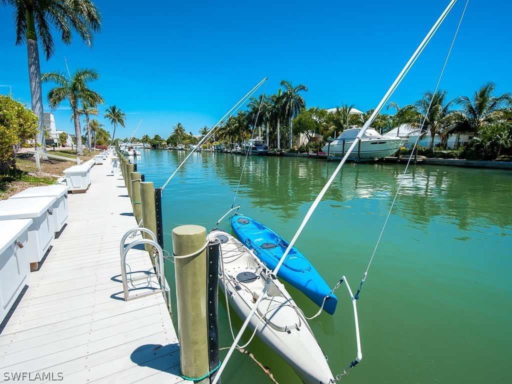 760 Sextant Drive, Unit 732 Sanibel, FL 33957 - Photo 27 of 35 a lake view with a garden